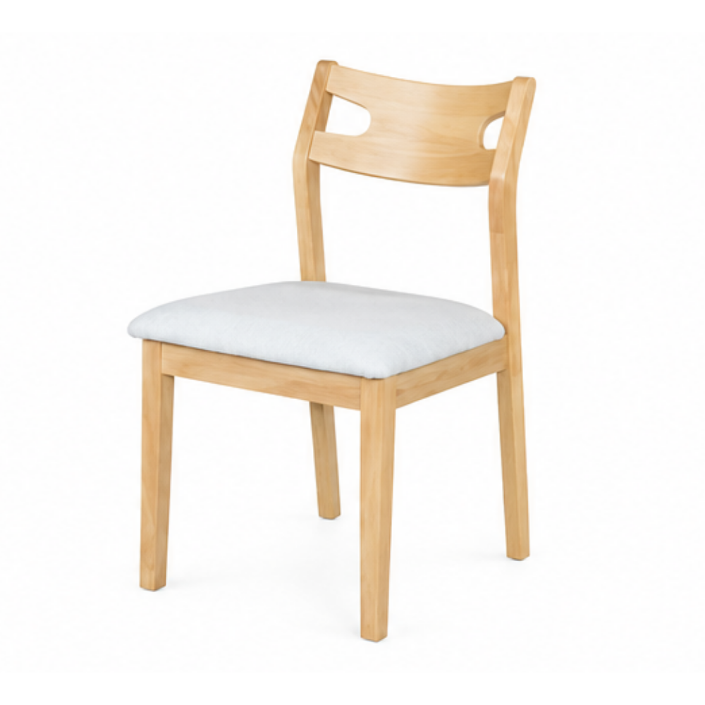 A light natural wood dining chair with a light gray upholstered seat cushion, shown from a three-quarter angle on a white background.