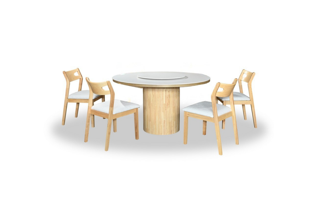 Dining table with four chairs on a white background