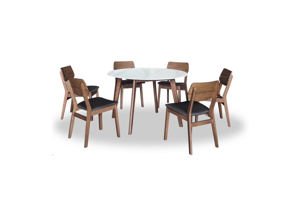 Dining table set with six wooden chairs on a white background