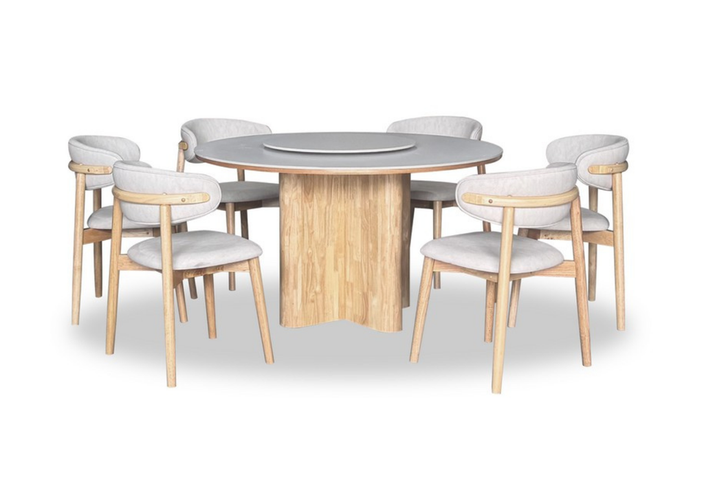 Dining table set with wooden legs and white cushioned chairs on a white background