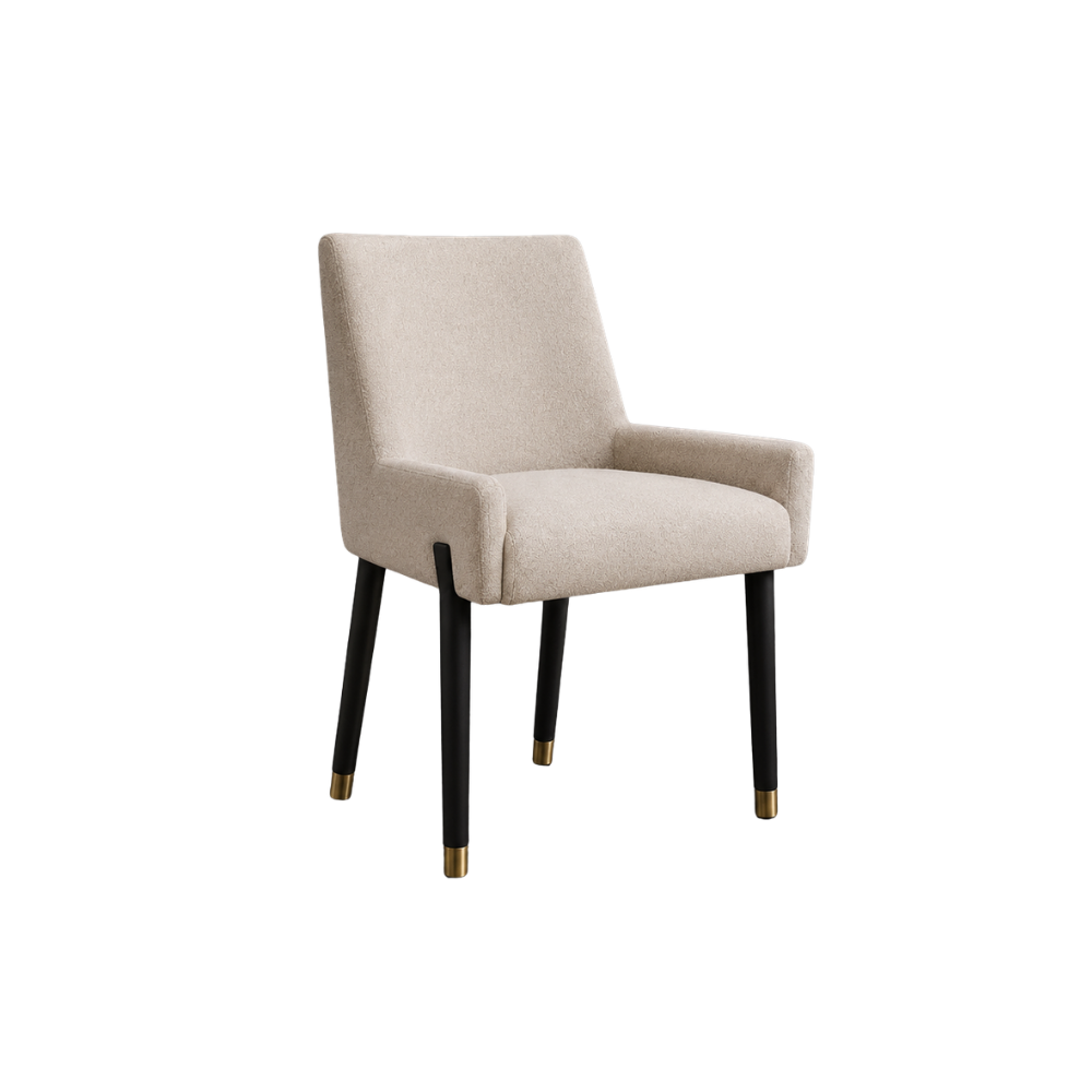 Beige upholstered chair with black legs on a white background