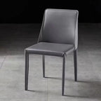 Gray chair on a dark floor