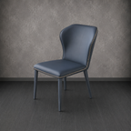 Blue chair with studded details against a gray wall