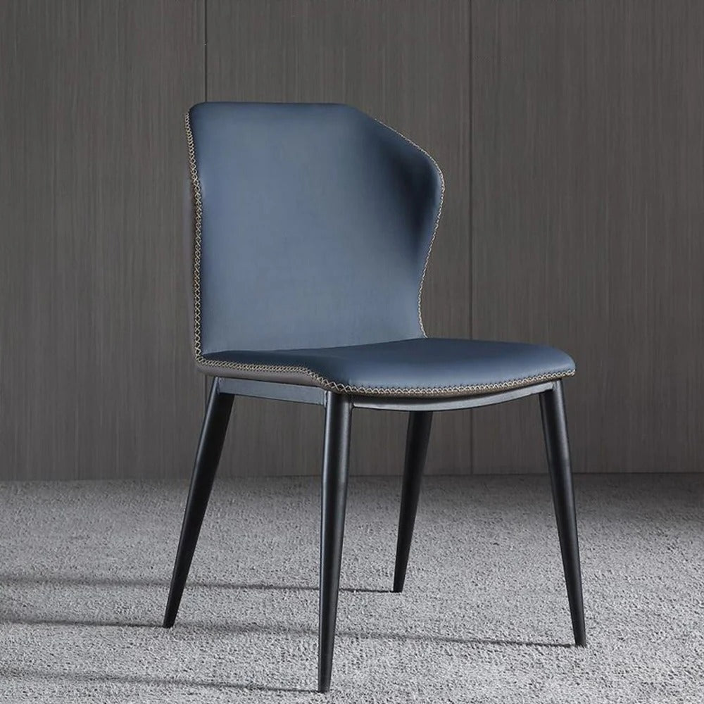 Blue chair with black legs on a gray carpet and wooden floor.