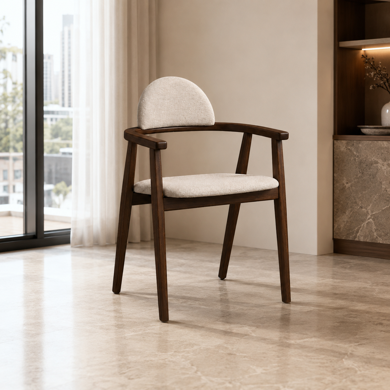 A modern wooden dining chair with a curved backrest and upholstered seat cushion in a neutral beige fabric, set in a minimalist interior with a marble floor and large window.
