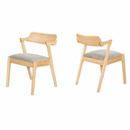 Two wooden chairs with gray cushions on a white background