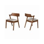 Two wooden chairs with beige cushions on a white background