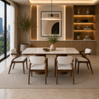 Modern dining room with a table and chairs in a stylishly decorated room.