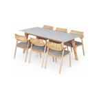Dining table set with six chairs on a white background