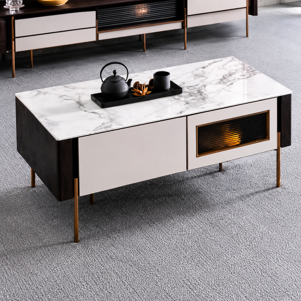 Modern coffee table with marble-like top and decorative items on a gray carpeted floor.