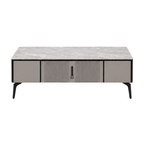 A modern rectangular coffee table with a gray marble-look top, a central ribbed door, and two flanking doors in a warm gray finish, supported by slim black legs.