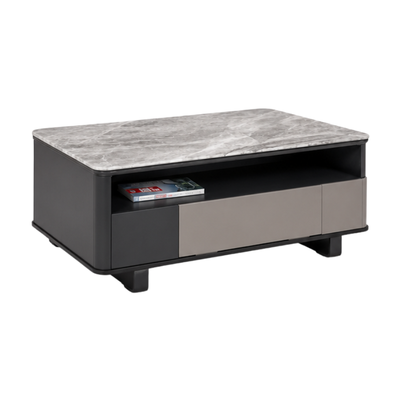 A modern rectangular coffee table with a gray marble-patterned top, a black body, and a lower shelf featuring a dark panel on the left and a light taupe panel on the right. A remote control rests inside the open shelf.