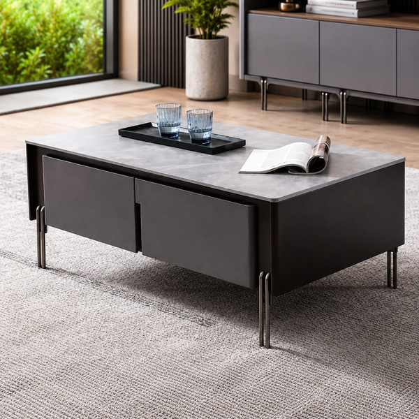 Modern coffee table with decorative items in a living room setting