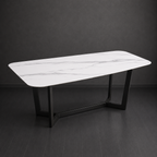 Marble-patterned table with black legs on a dark gray background