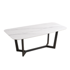 White dining table with black metal legs on a white background