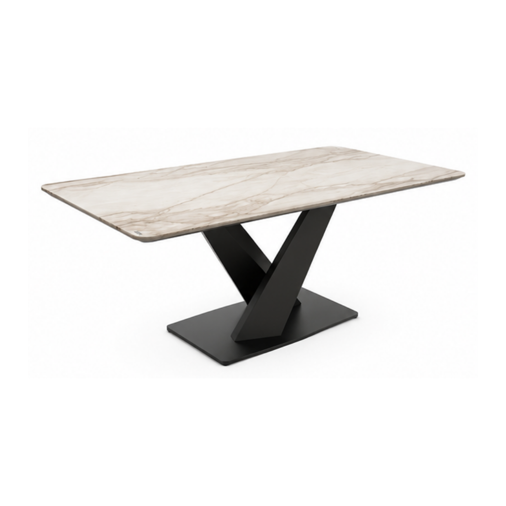 Dining table with marble-like top and black metal base on a white background