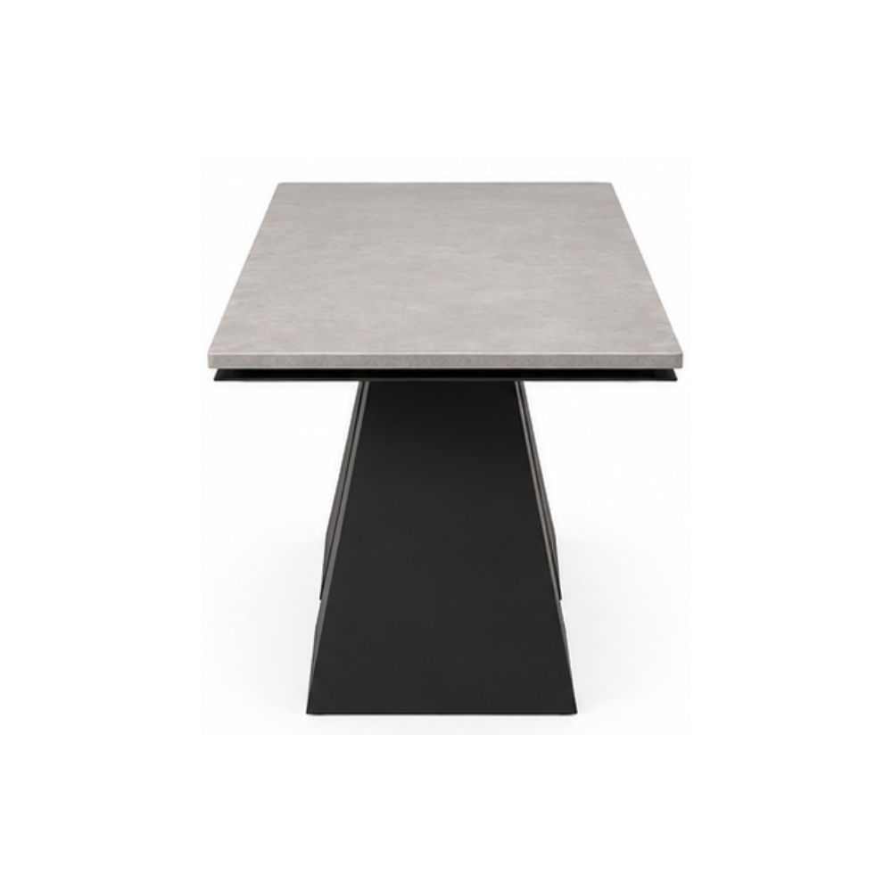 Modern side table with a concrete top and black base on a white background