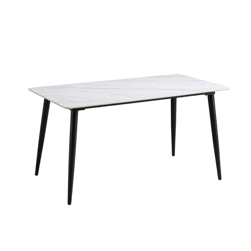 Dining table with white marble-like top and black legs on a white background